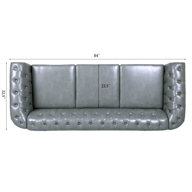 Divano Chesterfield a 3 posti con braccioli arrotolati