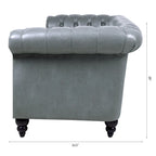Divano Chesterfield a 3 posti con braccioli arrotolati