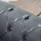 Divano Chesterfield a 3 posti con braccioli arrotolati