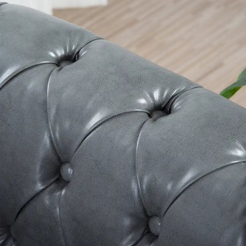 Divano Chesterfield a 3 posti con braccioli arrotolati