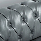 Divano Chesterfield a 3 posti con braccioli arrotolati