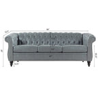 Divano Chesterfield a 3 posti con braccioli arrotolati