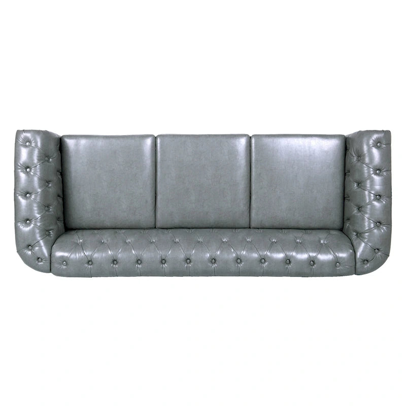 Divano Chesterfield a 3 posti con braccioli arrotolati