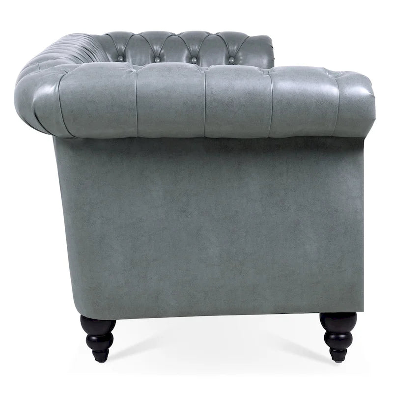 Divano Chesterfield a 3 posti con braccioli arrotolati