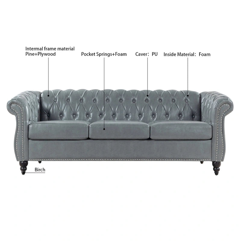 Divano Chesterfield a 3 posti con braccioli arrotolati