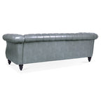 Divano Chesterfield a 3 posti con braccioli arrotolati