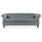 Divano Chesterfield a 3 posti con braccioli arrotolati