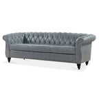 Divano Chesterfield a 3 posti con braccioli arrotolati
