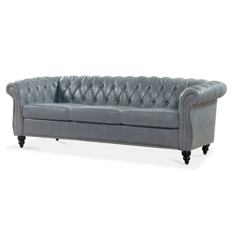 Divano Chesterfield a 3 posti con braccioli arrotolati