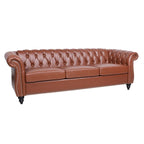 Divano Chesterfield a 3 posti con braccioli arrotolati