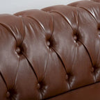 Divano Chesterfield a 3 posti con braccioli arrotolati
