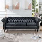 Divano Chesterfield a 3 posti con braccioli arrotolati