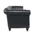 Divano Chesterfield a 3 posti con braccioli arrotolati